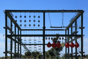 A high ropes course with platforms and rope bridges