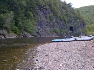 Jim Thorpe River Adventures rafts on the bank of the Lehigh River at Glen Onoko