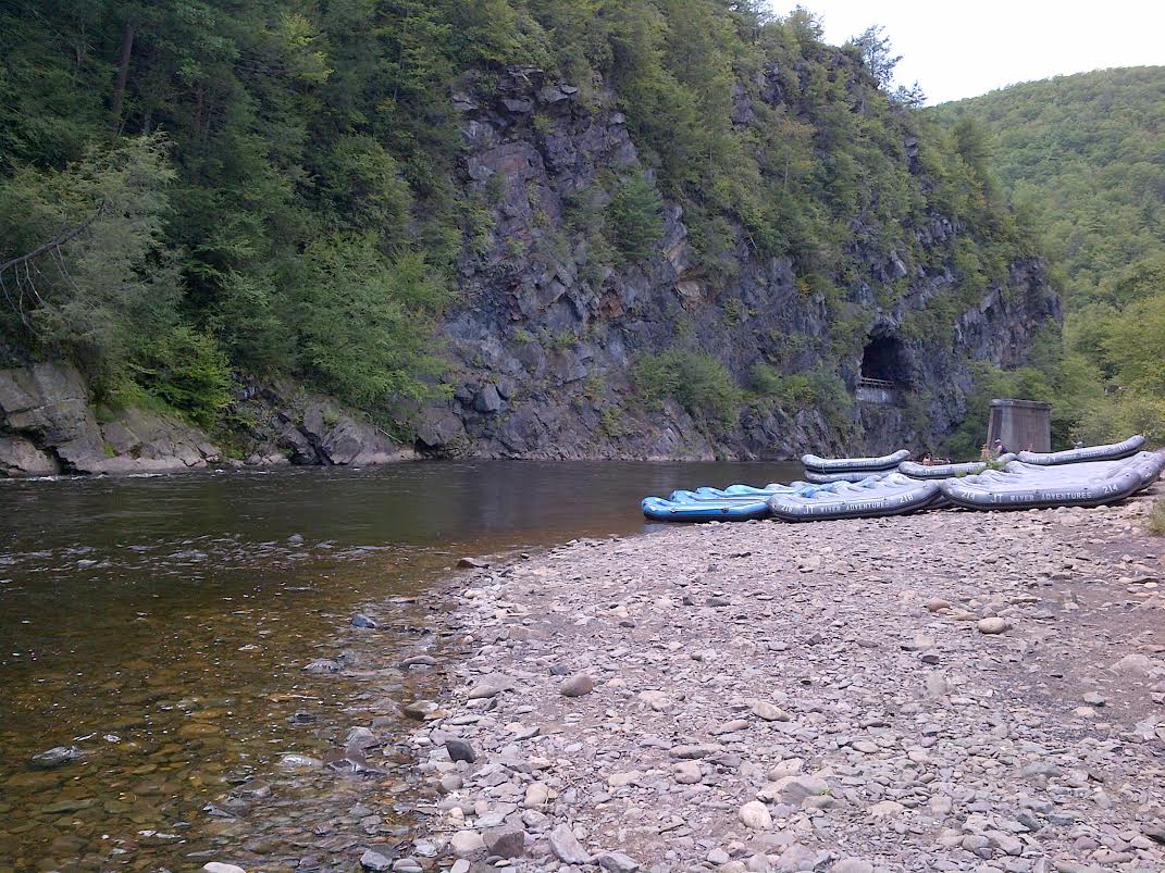 Jim Thorpe River Adventures rafts on the bank of the Lehigh River at Glen Onoko