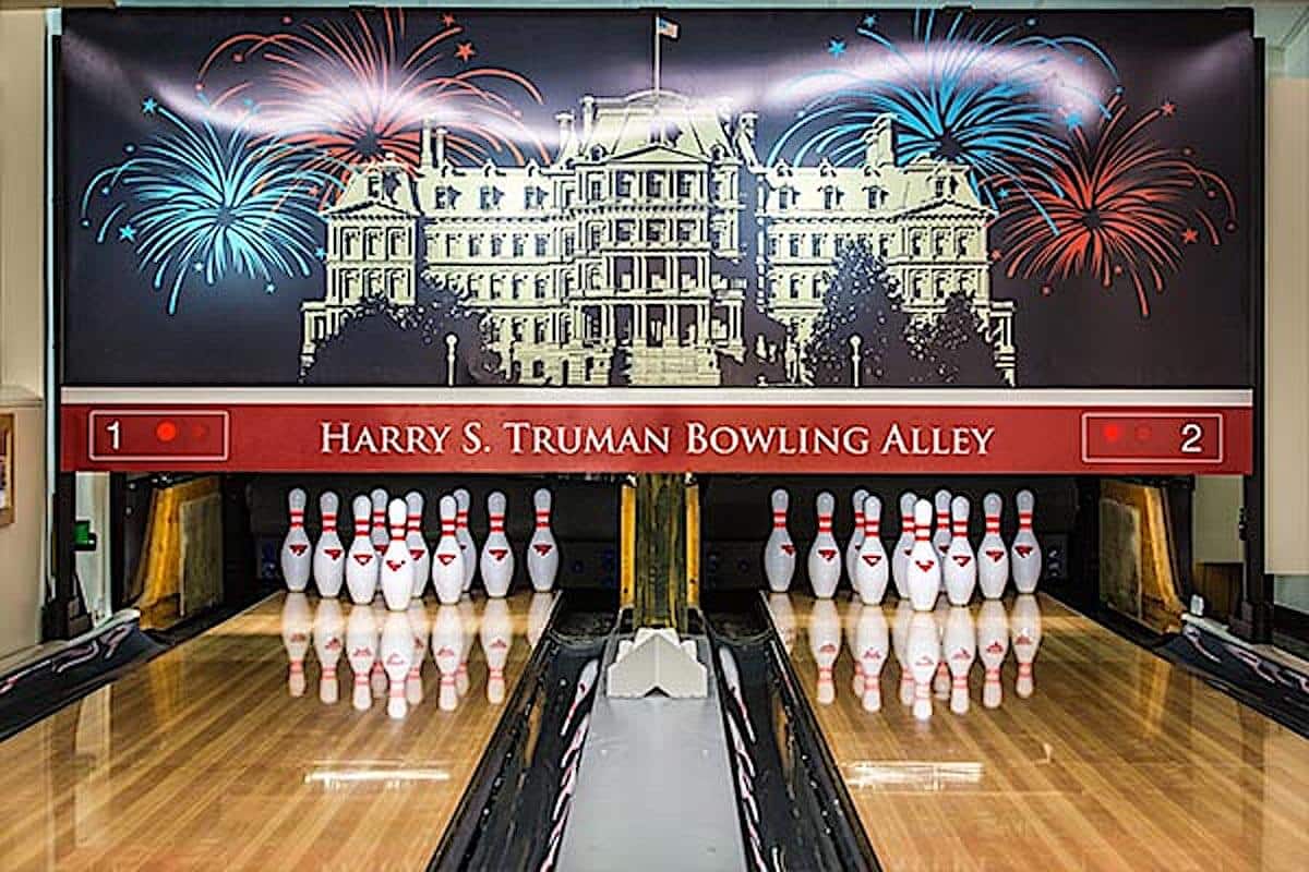Polished wooden bowling lanes and pins