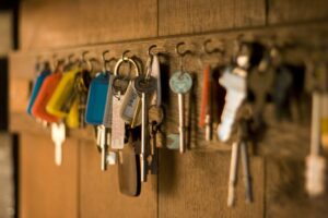 House keys on hooks, representing the benefits when you book direct with the owner in Lake Harmony